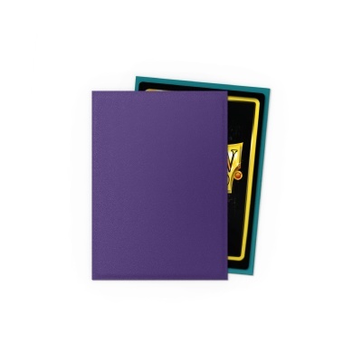 Livro ou agenda com capa roxa sobre objeto preto com moldura amarela