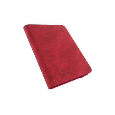 Capa vermelha com texto GAMEGENIC numa superfície branca.