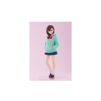 Figura colecionável de personagem feminina com casaco verde e saia azul