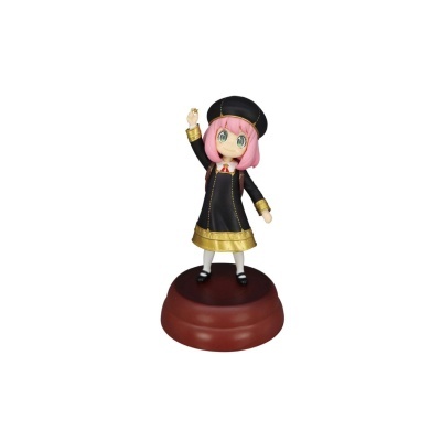 Figura de boneca com vestido preto e dourado sobre base castanha