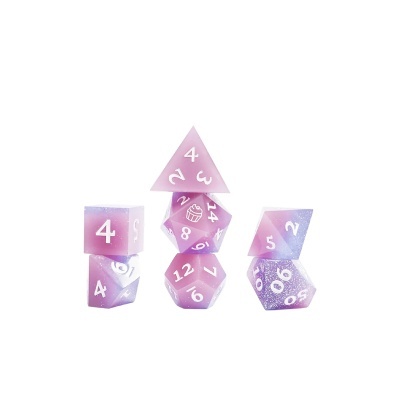 Conjunto de dados poliédricos roxos e rosa com brilho branco