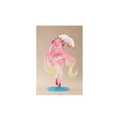Figura anime rosa com vestido e guarda-chuva em base azul vista de trás