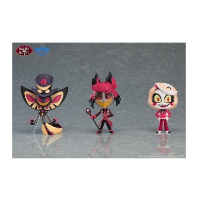 Figuras vinilha coloridas de personagens do Hazbin Hotel sobre fundo cinza.