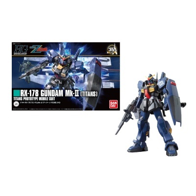 Figura RX-178 Gundam Mk-II azul escuro e cinza com arma e escudo ao lado da caixa com ilustração do mesmo robô