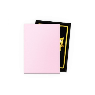 Capa de cartão rosa claro sobre cartão preto com detalhes dourados