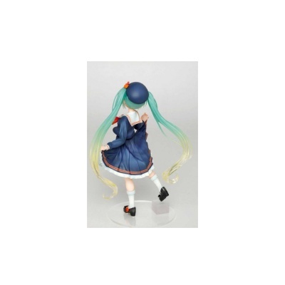 Figura anime com cabelo verde-água e vestido azul marinho