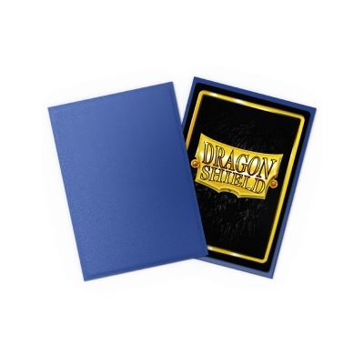 Protetoes de cartas Dragon Shield com capa azul e cartas pretas com detalhe amarelo