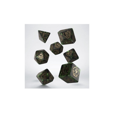 Dados poliedros de jogo preto e verde com números dourados e desenhos de dragão