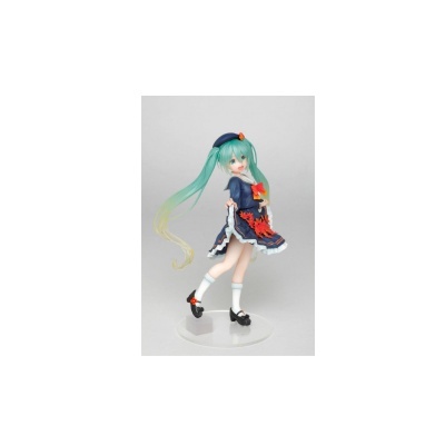 Figura colecionável de personagem com vestido azul e cabelo verde-água