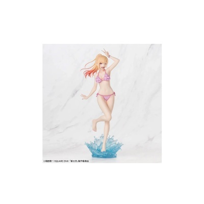 Figura colecionável de personagem feminina em bikini rosa com base azul imitando onda