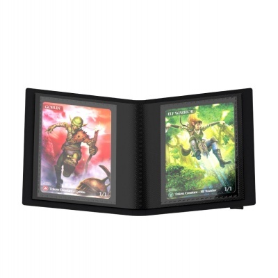 Álbum aberto com duas cartas de jogo colecionável, Goblin e Elf Warrior