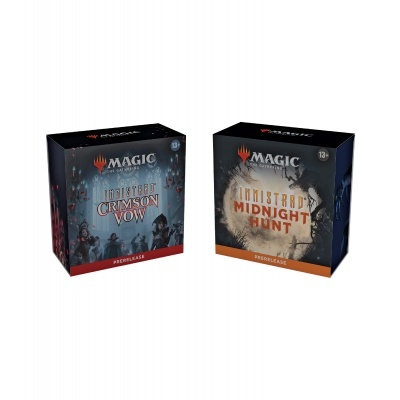 Duas caixas de jogos de cartas Magic The Gathering com textos Midnight Crimson Vow e Midnight Hunt