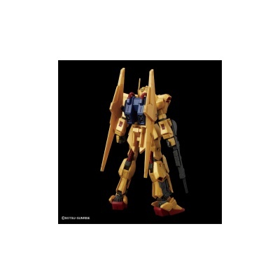 Figura amarela de plástico tipo robô/mecha com detalhes em azul, vermelho e preto