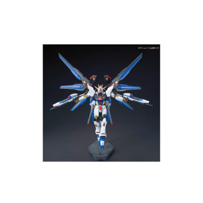 Figura de ação robô tipo mecha branco, azul, vermelho e dourado com asas grandes e base cinzenta