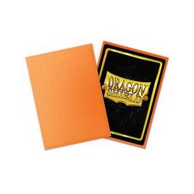 Duas capas protetoras para cartas laranja e preta com texto DRAGON SHIELD