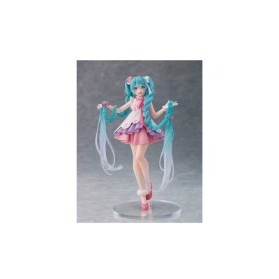 Figura colecionável de cantora anime com cabelo azul comprido e vestido cor-de-rosa.