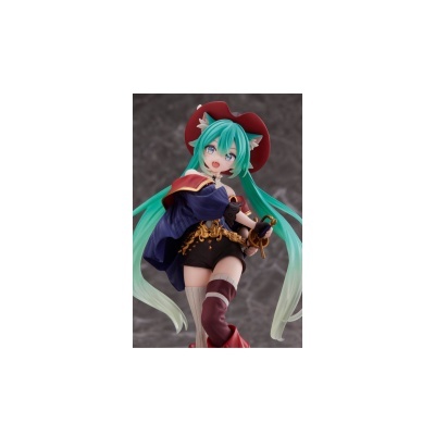 Figura colecionável de personagem feminina com cabelo verde, chapéu vermelho e roupa azul e preta