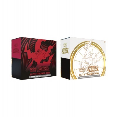 Duas caixas de cartas Pokémon Elite Trainer Box, uma vermelha e preta e outra branca e dourada