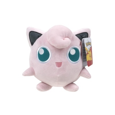 Pelúcia cor-de-rosa de personagem anime com olhos grandes e etiqueta Pokémon