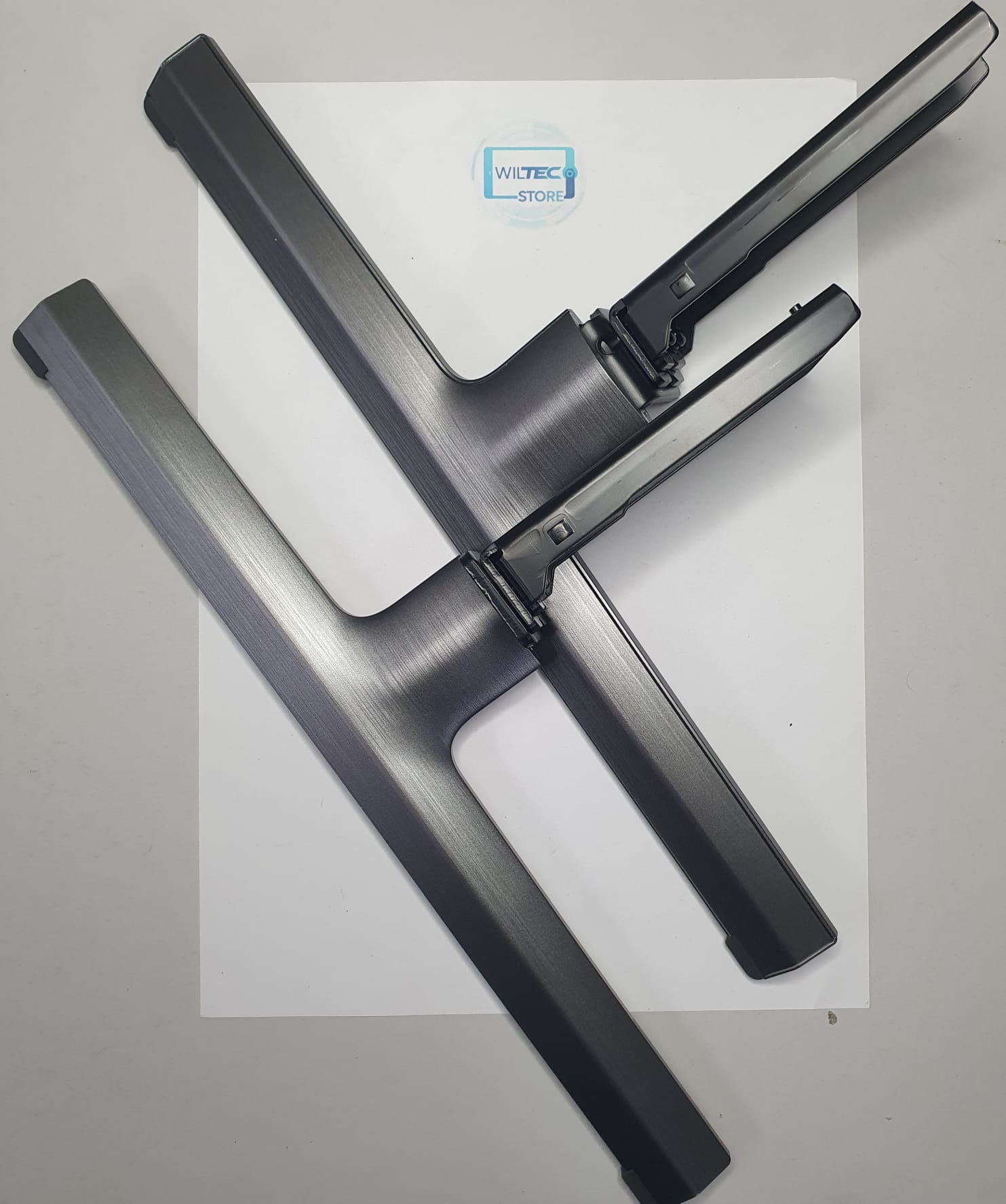 Base TV Sony KD-55X85L Par de pés metálicos para televisão cinza escuro com selo WILTEC STORE.