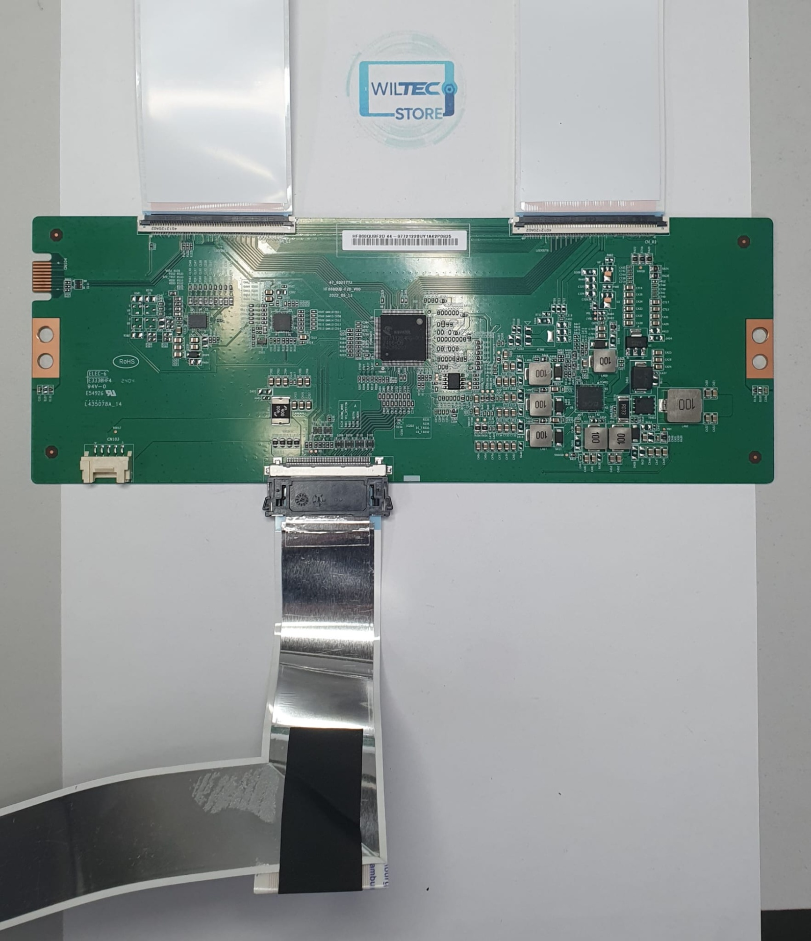 T-Con TV LG 86UR78006LB / HF860QUBF2D Placa de circuito verde com componentes eletrónicos integrada e fitas flexíveis sobre fundo branco