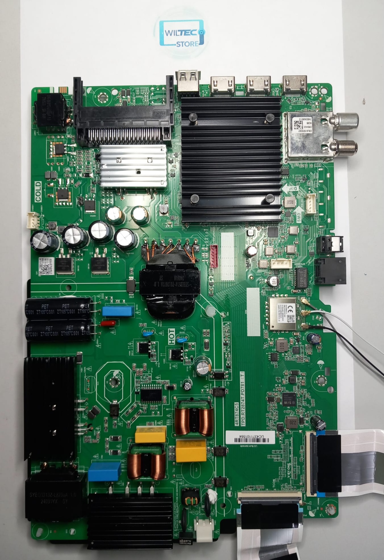 Mainboard TV LG 65UT73006LA / TPD.RT2874T.PD781(T) Placa eletrónica verde com vários componentes e conectores sobre fundo branco.