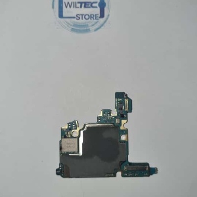 Placa eletrónica com circuito azul e preto sobre fundo branco com selo WILTEC STORE