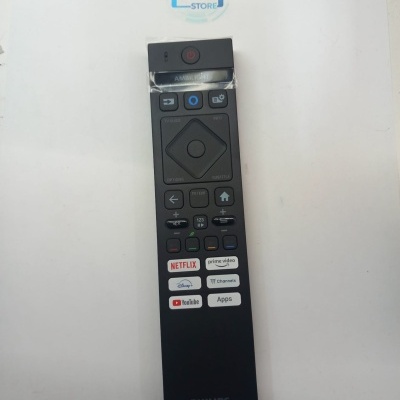 Comando remoto preto PHILIPS com botões para serviços de streaming e funções multimédia