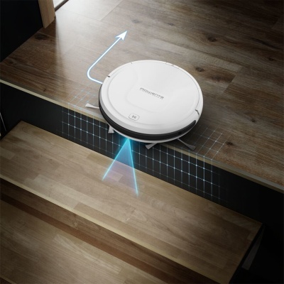 Robot aspirador branco ROWENTA a detetar um degrau em chão de madeira