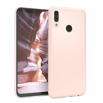 Smartphone com capa rosa claro e ecrã de desfiladeiro rochoso