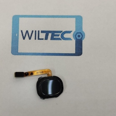 Componente electrónico pequeno com fita flexível sobre superfície com logo WILTEC