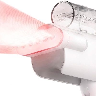 Aparelho vaporizador branco com reservatório transparente e saída de vapor