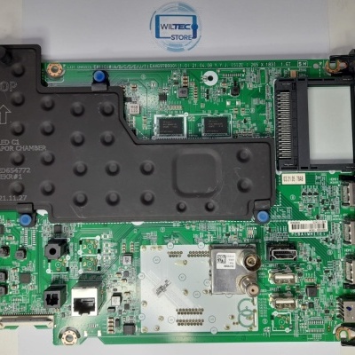 Placa eletrónica com dissipador preto e etiquetas, sobre fundo branco com adesivo WILTEC STORE