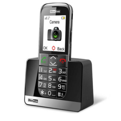 telefone fixo Maxcom preto com ecrã digital e teclado numérico em suporte de carregamento