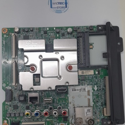 Placa eletrónica verde com dissipador de metal e várias portas coloridas, logótipo WILTTEC STORE ao fundo