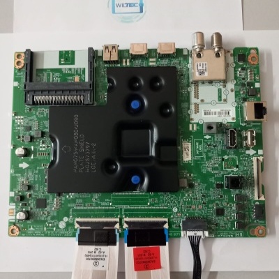 Placa eletrónica verde com escudo preto, portas USB, HDMI, Ethernet e cabos ligados