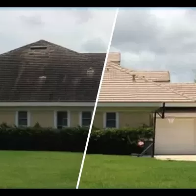 Casa amarela com dois tipos diferentes de telhados cerâmicos e garagem com porta dupla branca