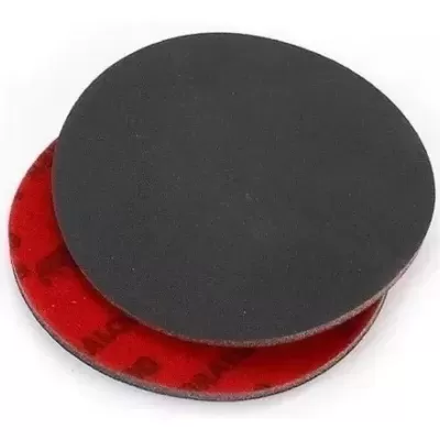 Dois discos redondos preto e vermelho sobre fundo branco