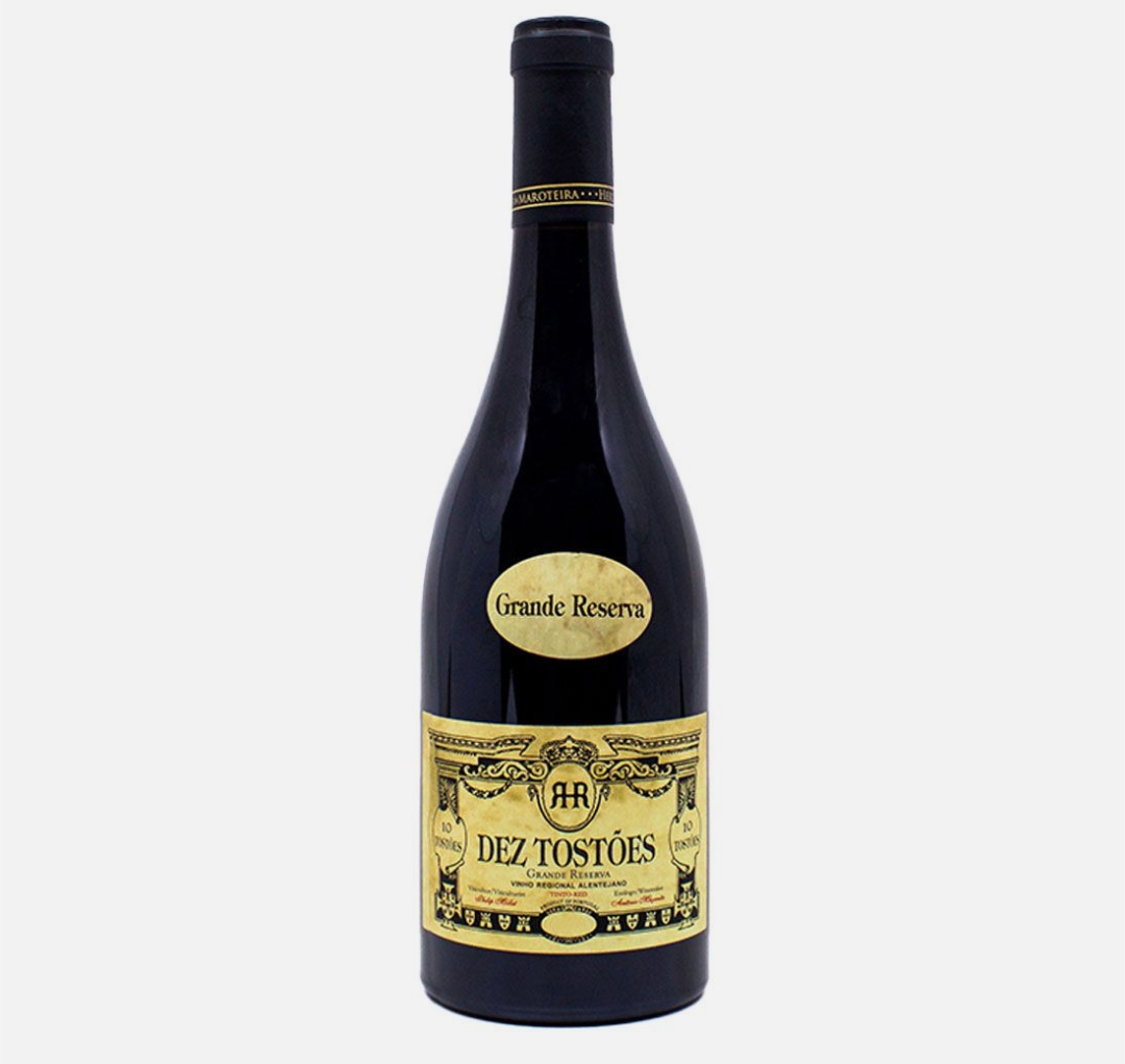 Garrafa de vinho preta com rótulo amarelo e texto Grande Reserva e DEZ TOSTÕES