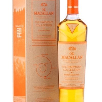 Garrafa de whisky The Macallan The Harmony Collection Amber Meadow com embalagem e rótulo em laranja e castanho claro