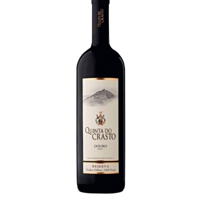 Garrafa de vinho Quinta do Crasto com rótulo branco e desenho de montanha
