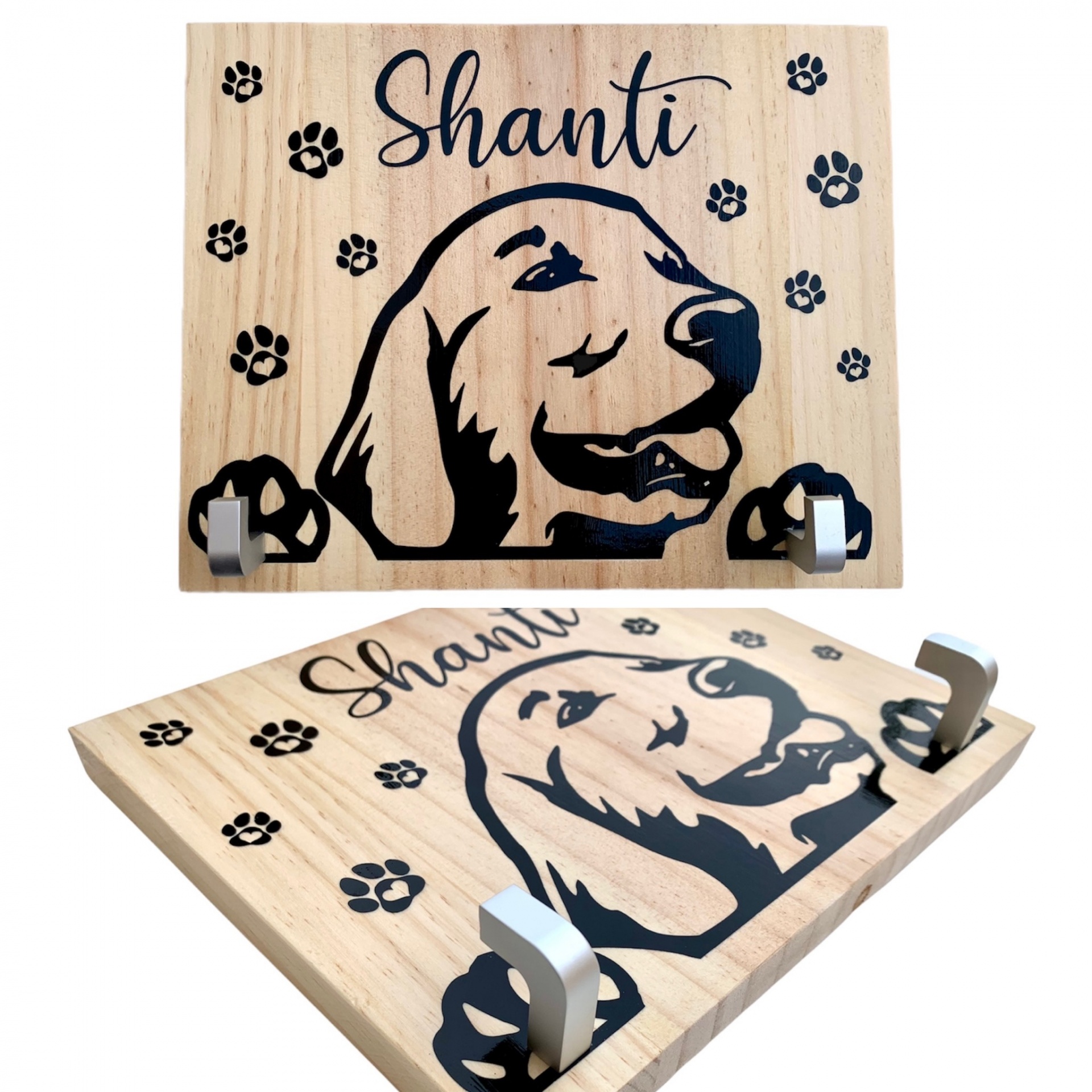 Placa de madeira com desenho de cão e texto 'Shanti' com ganchos metálicos