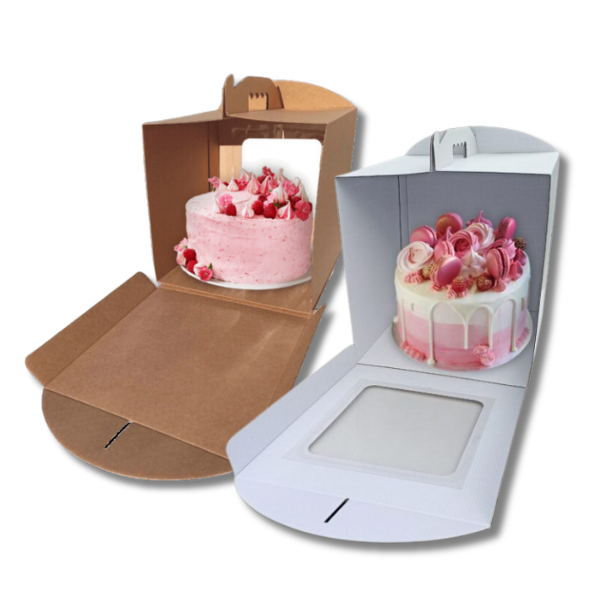 dois bolos decorados em caixas de transporte castanha e branca com janelas transparentes