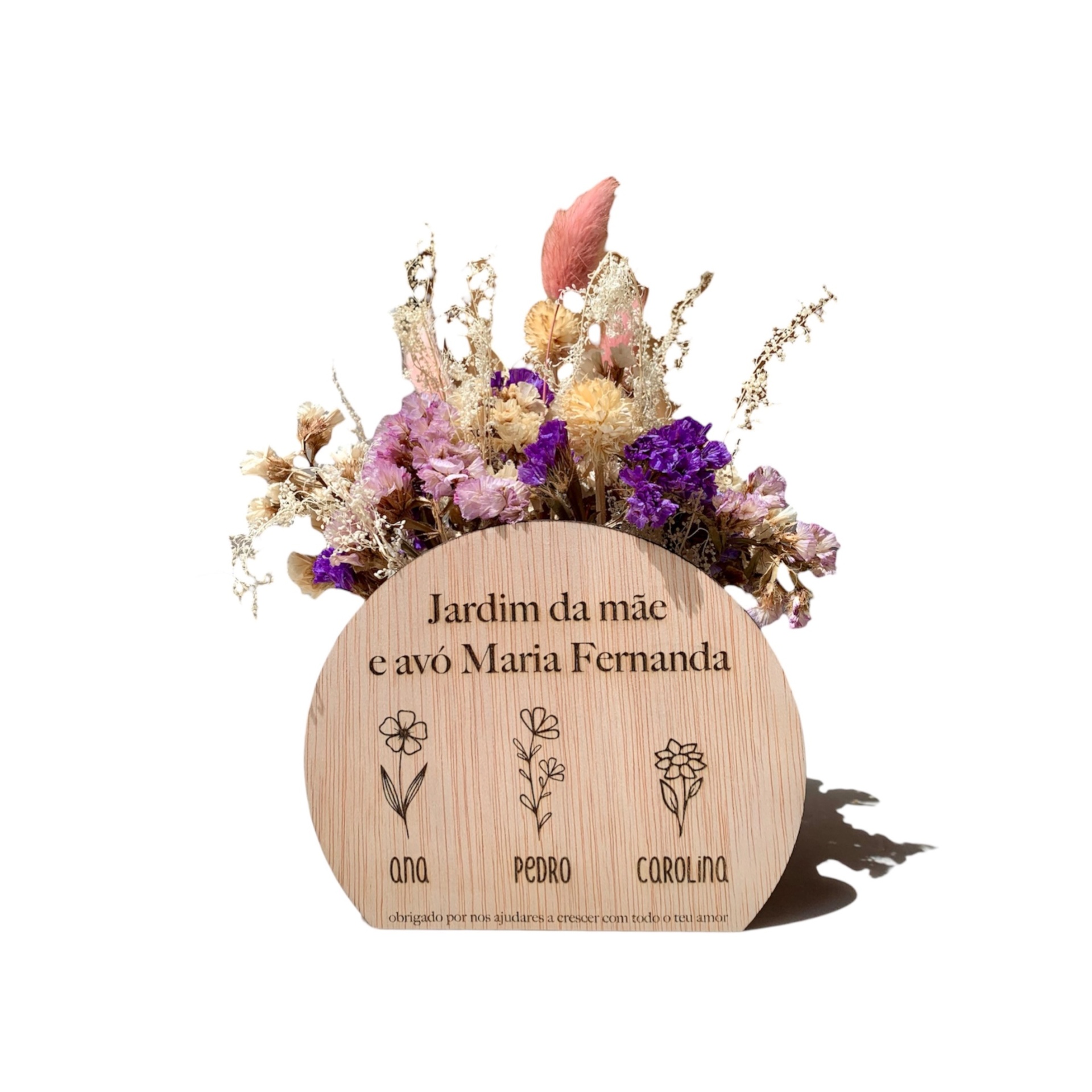 Placa de madeira com texto e flores secas coloridas