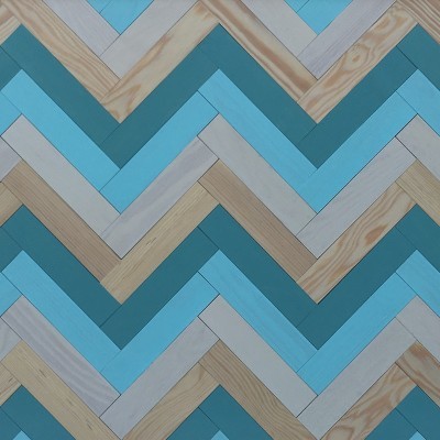 Azulejos em padrão ziguezague tons azul, bege e cinza imitando madeira