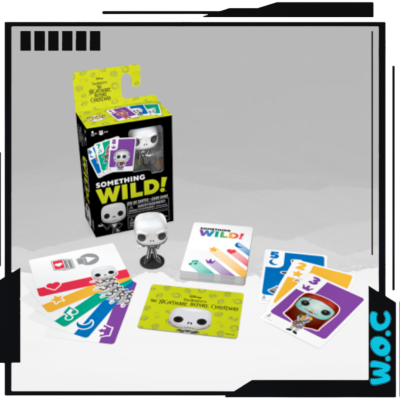 Jogo de cartas Something Wild! com cartas coloridas e figura de personagem
