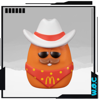 Figura colecionável McDonald's McNugget com chapéu de cowboy e cachecol vermelho.