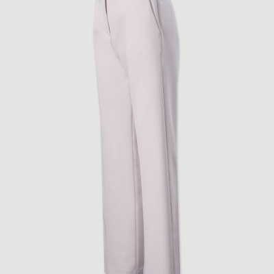 Calças compridas bege claro com detalhe preto na cintura