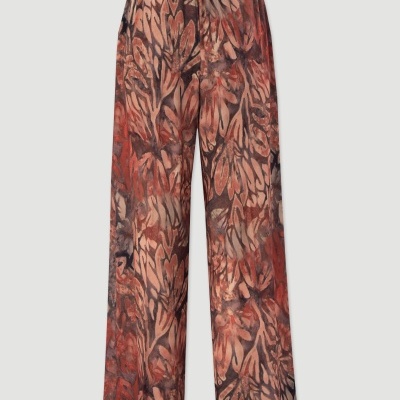 Calças largas com padrão abstrato castanho e laranja