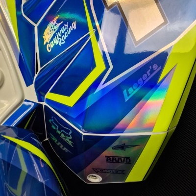 Carenagem azul e amarelo para mota com número 1 e logos